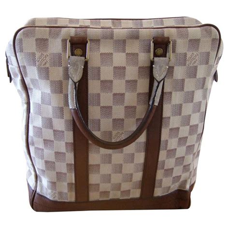 louis vuitton black checkered purse.